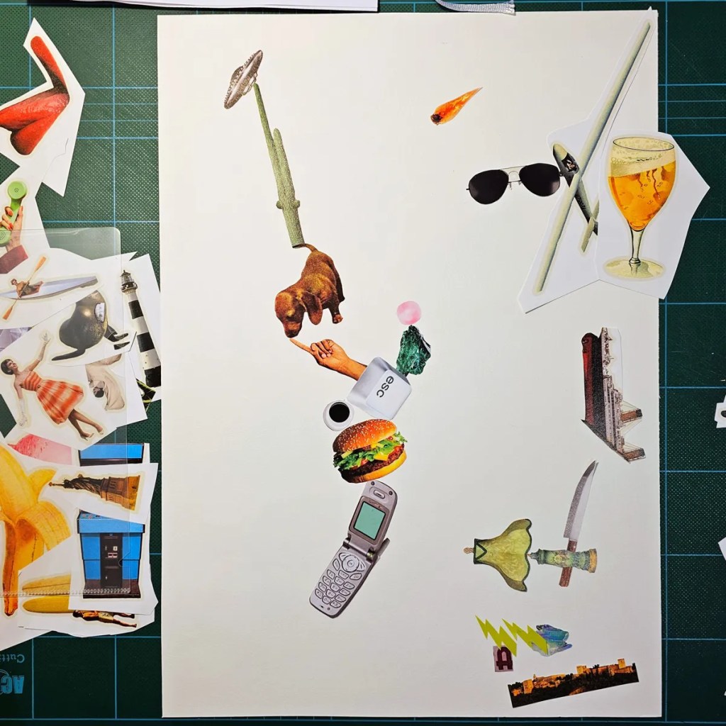 Looking down on a dark cutting mat and a3 piece of paper. On the paper and board are cut out images of objects including an escape key, a dashound, and an old flip style mobile phone.